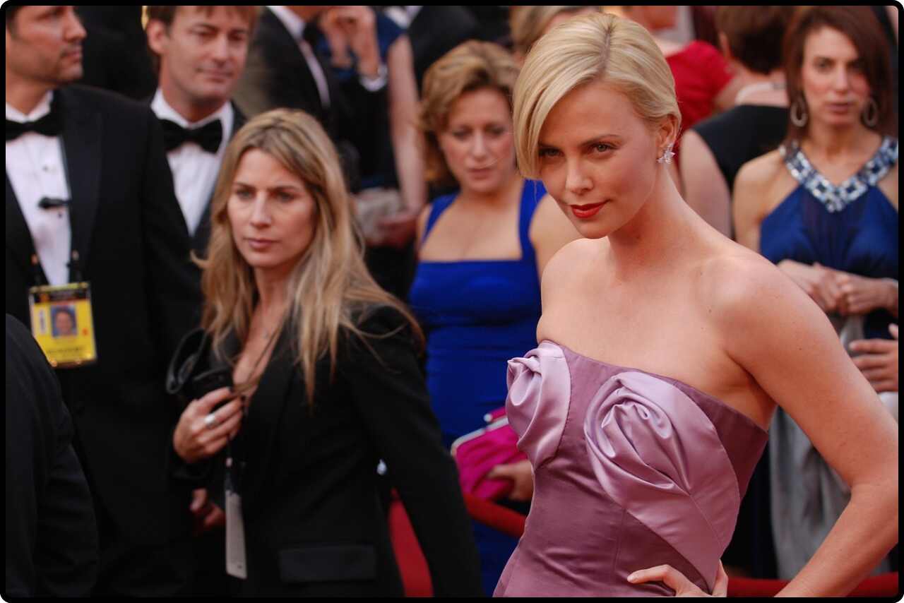 Charlize Theron interacting with fans during an event